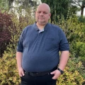 gładkie duze polo z kolnierzykiem mala kieszonka na guziki